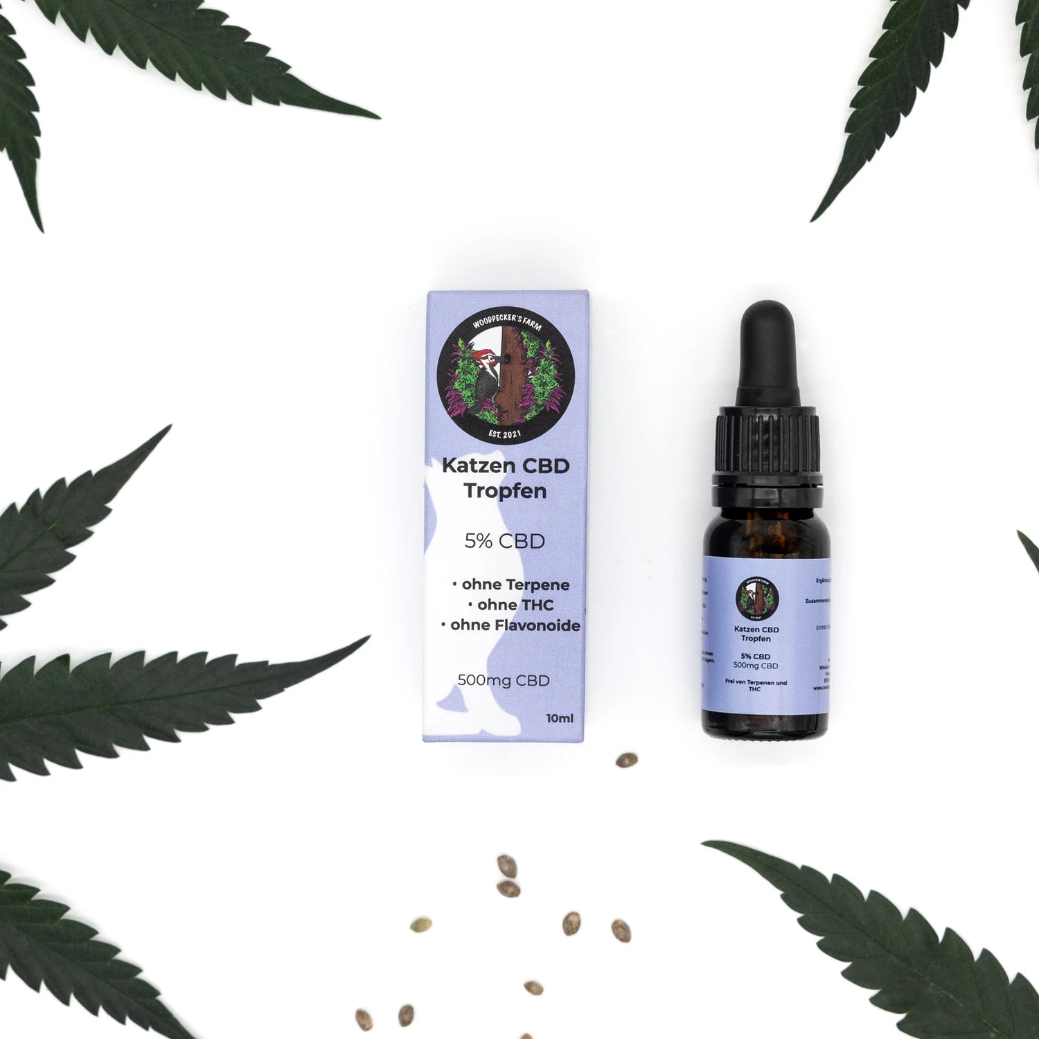 5% Katzen CBD Tropfen, braune Glasflasche mit Pipette, lila Verpackung, dekoriert mit Hanfblättern und Hanfsamen, ohne Terpene, THC-frei, speziell für Katzen entwickelt, 500mg CBD.